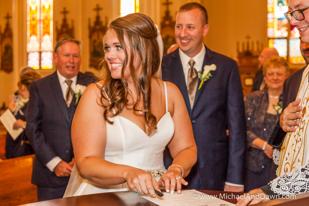 picture of bride signing marriage license